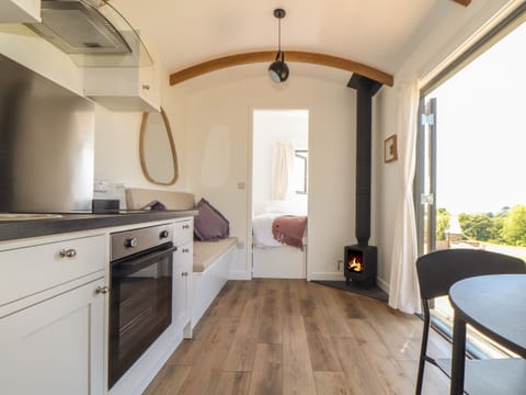 Fridge, electric kettle, cookware/dishes/utensils