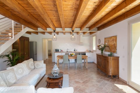 Villa | Living area | 32-inch flat-screen TV with cable channels, TV