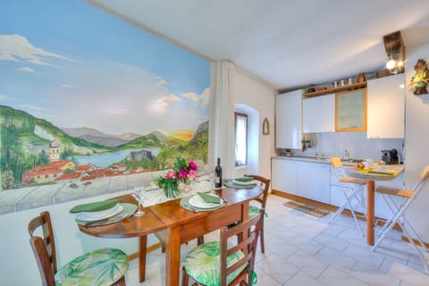 The dining table with the kitchen