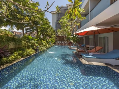 Outdoor pool, open 8:00 AM to 8:00 PM, sun loungers
