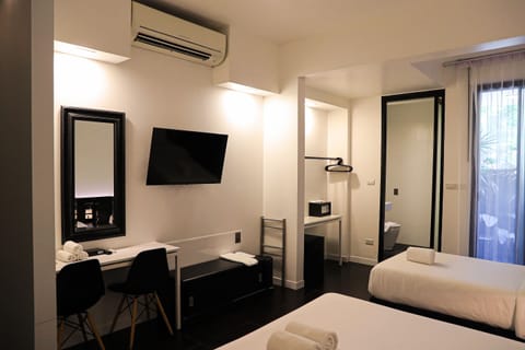 Triple Room (1 Double and 1 Single Bed)(Adults Only) | Premium bedding, minibar, in-room safe, desk