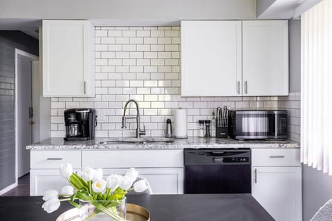 Prepare your favorite meals in this tidy and pristine kitchen