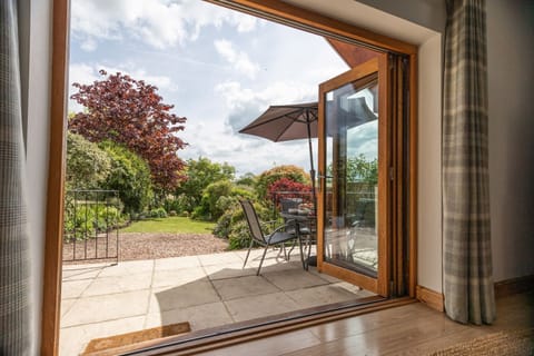Lower Court Cottage Patio View 1