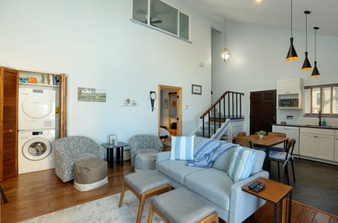 Nestled in the open area, you'll find a washer and dryer for your convenience. For extensive laundry needs, the complex features a convenient coin-operated facility.