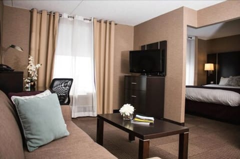 Suite, Multiple Beds, Non Smoking | Living area | Plasma TV