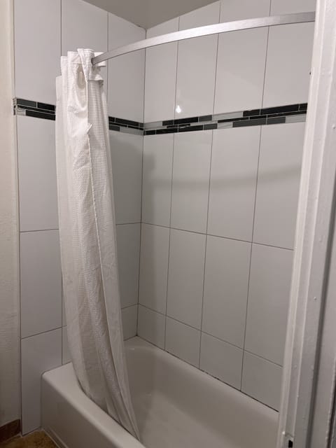 Deluxe Room, 1 Queen Bed, Accessible | Bathroom | Rainfall showerhead, designer toiletries, towels