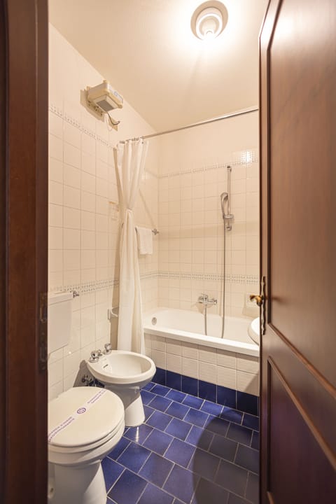 Hair dryer, bidet, towels, soap