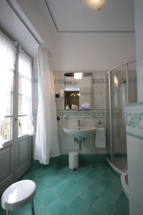 Executive Suite | Bathroom | Hair dryer, bidet, towels, soap