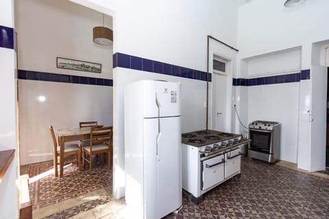 Main kitchen has the original oven and a modern gas oven & cooktop & dishwasher