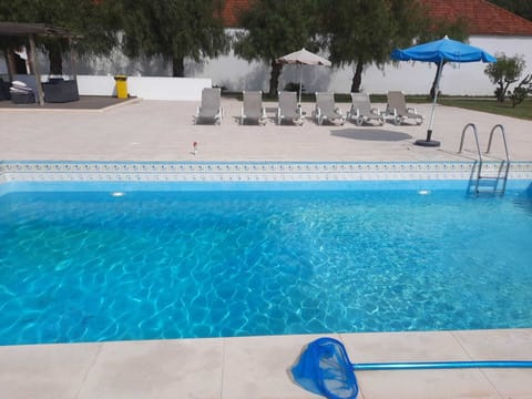 Seasonal outdoor pool, pool umbrellas, sun loungers