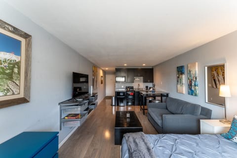 Sleeping area offering a queen-sized bed.