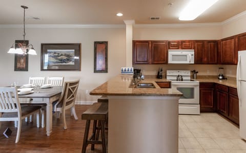 Condo, 2 Bedrooms | Private kitchen | Fridge, oven, coffee/tea maker, toaster