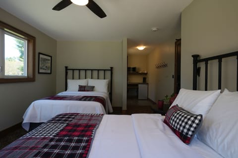 Lodge Room #3 (2 Double Beds) | Premium bedding, individually decorated, individually furnished