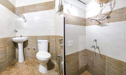 Deluxe Room | Bathroom | Shower, rainfall showerhead, free toiletries, towels