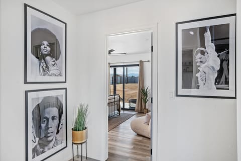 Entrance to master bedroom with portraits of influential musical artists