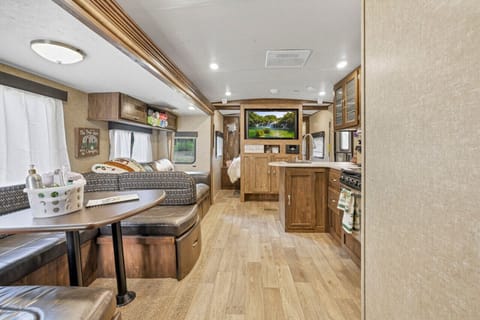 Living area, kitchen, and dining