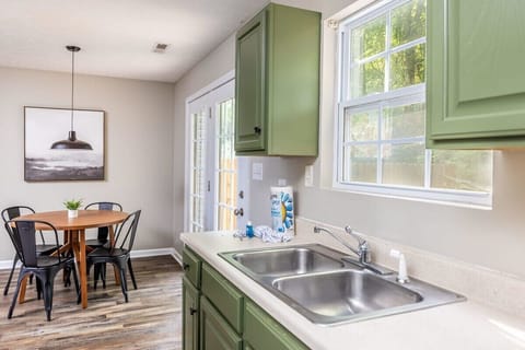 Dine & unwind with a fully functional kitchen setup.