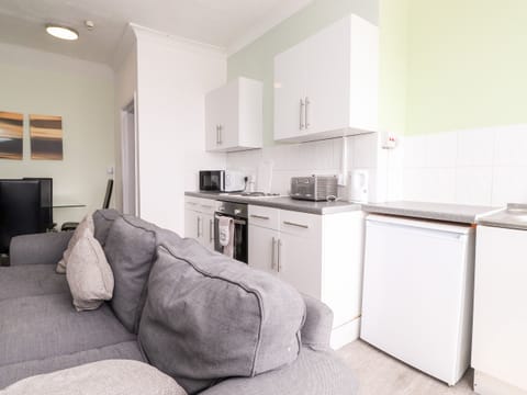 Fridge, electric kettle, toaster, cookware/dishes/utensils