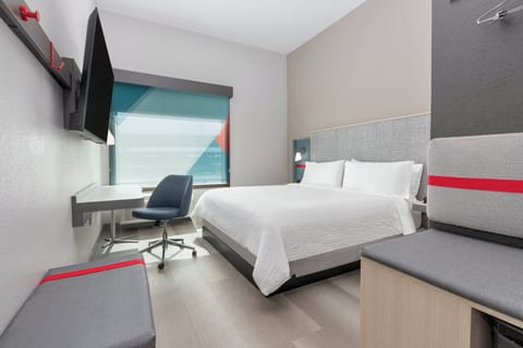 Desk, laptop workspace, blackout drapes, free cribs/infant beds