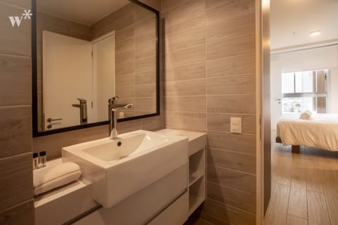 Executive Apartment | Bathroom | Shower, rainfall showerhead, hair dryer, heated floors