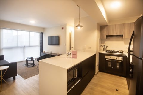 Grand Apartment | Private kitchen | Fridge, microwave