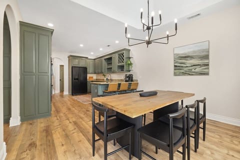 Just off the kitchen, you'll find our eight-top dining table.