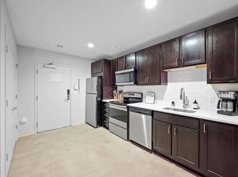 Apartment, 1 Queen Bed | Private kitchen | Fridge, microwave, oven, stovetop