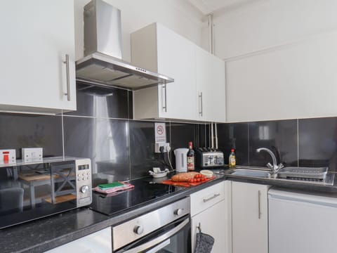 Fridge, electric kettle, toaster, cookware/dishes/utensils