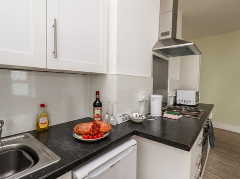 Fridge, electric kettle, toaster, cookware/dishes/utensils