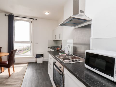 Fridge, electric kettle, toaster, cookware/dishes/utensils