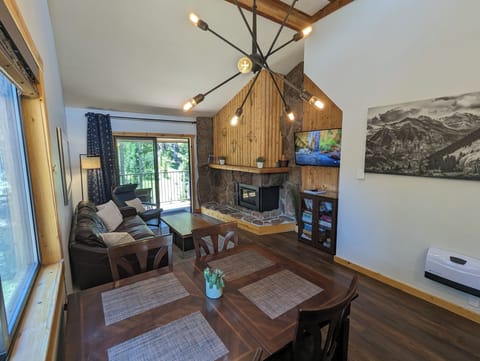Main living area with forest views.