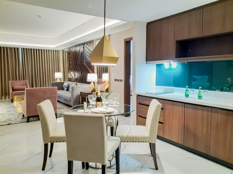 Two Bedroom Suite | Living area | 49-inch LED TV with cable channels, TV