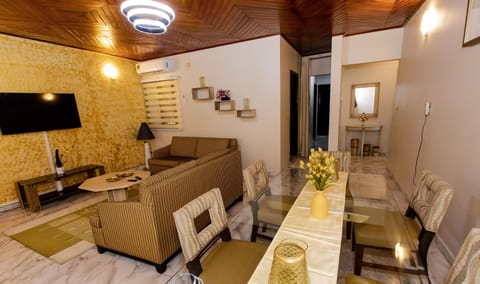 Family Apartment, 2 Bedrooms | Living area | Flat-screen TV