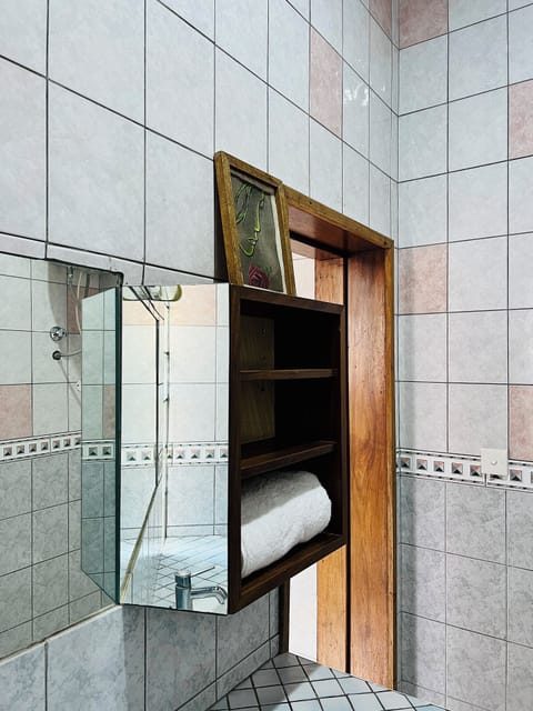 Double Room | Bathroom | Shower, rainfall showerhead, hair dryer, slippers