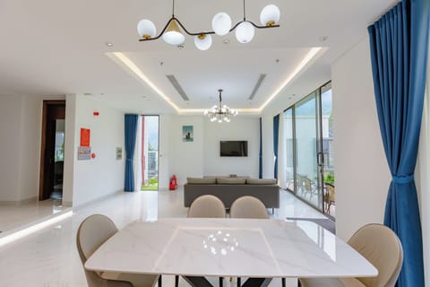 Premium Villa | Living area | Flat-screen TV
