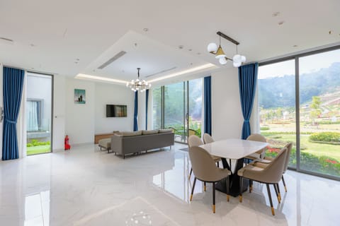 Premium Villa | Living area | Flat-screen TV