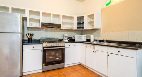 Family Apartment | Private kitchen | Fridge, microwave