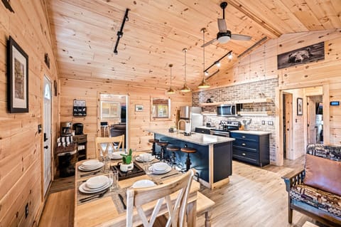 Gather around the dining table for family meals, just steps from the heart of the home.