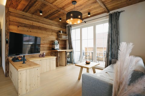 The nest with private sauna | Living area | 108-cm flat-screen TV with satellite channels, heated floors