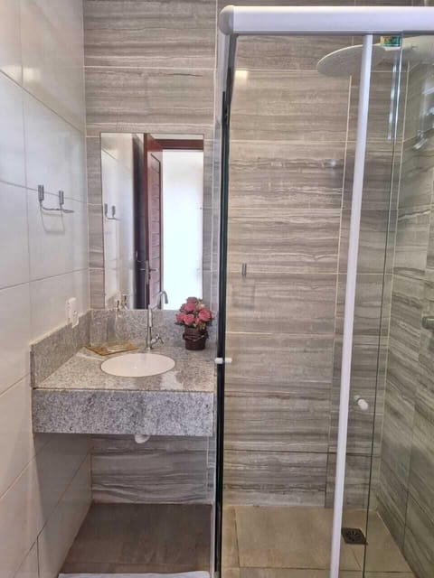 Standard Studio Suite | Bathroom | Shower, hair dryer, towels