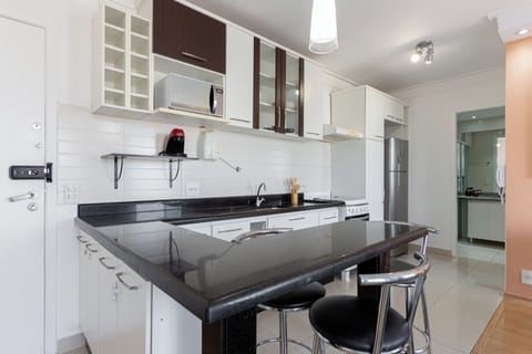 Apartment | Private kitchen | Full-size fridge, microwave, cookware/dishes/utensils