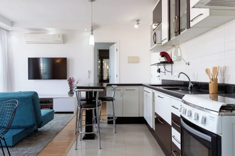 Apartment | Private kitchen | Full-size fridge, microwave, cookware/dishes/utensils