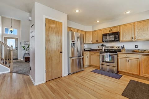 Seamless Living and Dining! Our Spacious Kitchen is Adjacent to the Living Room for Comfortable and Convenient Cooking and Relaxing.