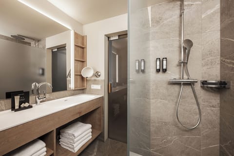 Family Studio, Balcony, Lake View | Bathroom | Shower, hair dryer, slippers, towels