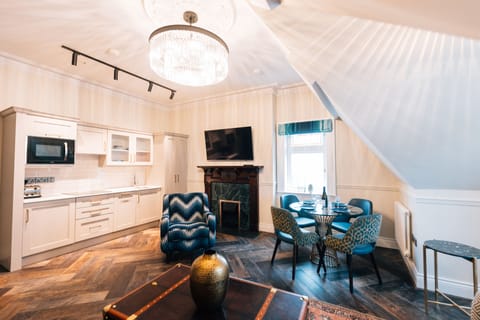 The Loft | Living area | 55-inch LED TV with satellite channels, DVD player