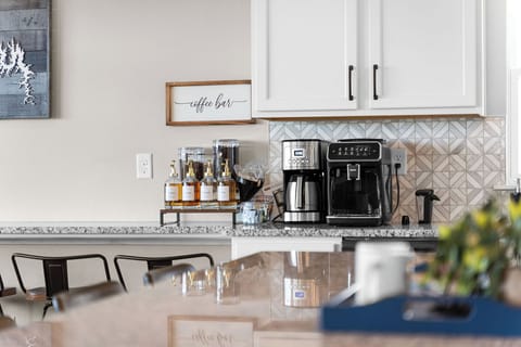 Enjoy some custom morning brews from the Phillips LatteGo coffee and espresso maker with ground and whole bean coffee and flavors provided.