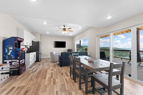 Enjoy some games together at the game table, 2 arcade systems, foosball table, and smart TV