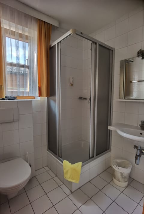 Standard Double Room | Bathroom | Shower, hair dryer, bathrobes, towels