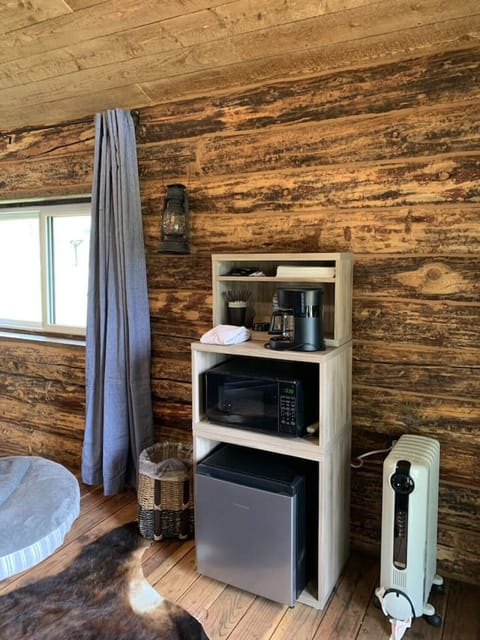 The basics you may need. Mini fridge, microwave, coffee maker, room heater, swamp cooler, and ceiling fan.