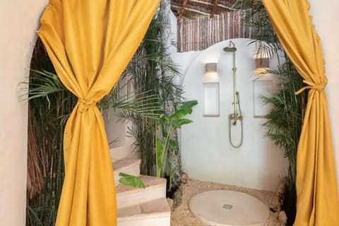 Deluxe Villa | Bathroom | Separate tub and shower, rainfall showerhead, towels, soap